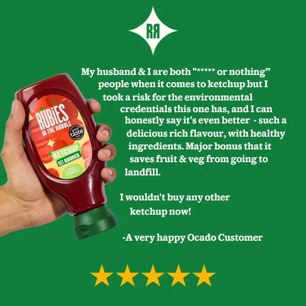 Image of a hand holding the Rubies in the Rubble ketchup bottle with the following review stated: My husband & I are both 